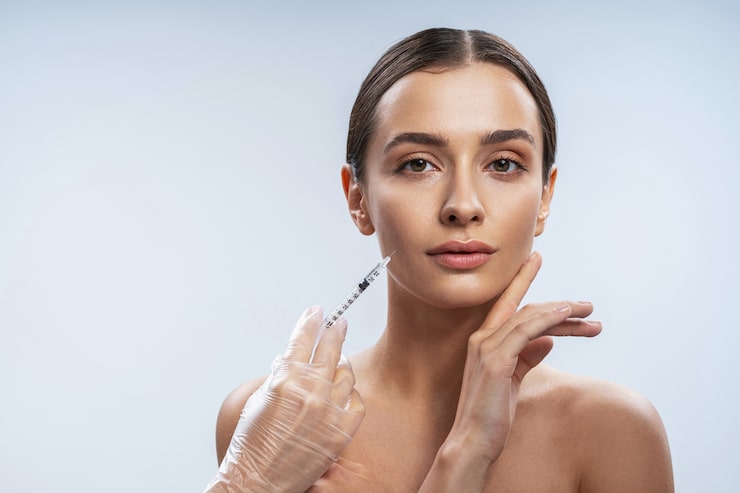Calm client receiving a wrinkle-reducer consultation